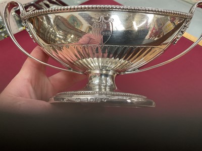 Lot 152 - A fine pair of George III Neo-Classical silver sauce tureens by John Schofield, London 1788.