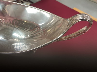 Lot 152 - A fine pair of George III Neo-Classical silver sauce tureens by John Schofield, London 1788.