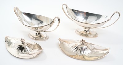 Lot 152 - A fine pair of George III Neo-Classical silver sauce tureens by John Schofield, London 1788.