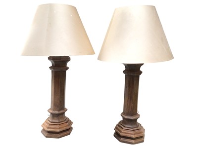 Lot 706 - Pair of 19th century style gothic oak table lamps with octagonal faciated columns with shades