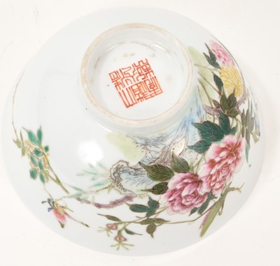 Lot 27 - Chinese famille rose porcelain bowl, 20th century, painted with a grasshopper and butterfly amongst flowers, calligraphy verso, seal mark to base, 11.5cm diameter