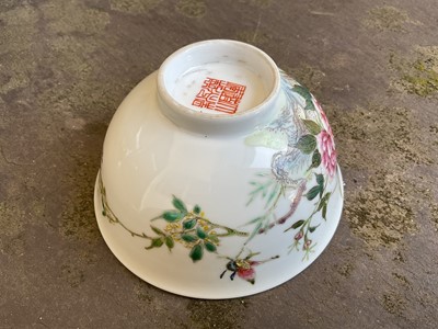 Lot 27 - Chinese famille rose porcelain bowl, 20th century, painted with a grasshopper and butterfly amongst flowers, calligraphy verso, seal mark to base, 11.5cm diameter