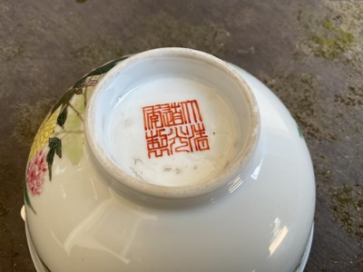 Lot 27 - Chinese famille rose porcelain bowl, 20th century, painted with a grasshopper and butterfly amongst flowers, calligraphy verso, seal mark to base, 11.5cm diameter