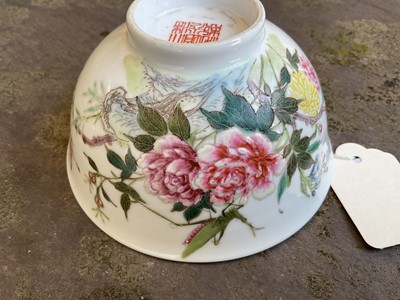 Lot 27 - Chinese famille rose porcelain bowl, 20th century, painted with a grasshopper and butterfly amongst flowers, calligraphy verso, seal mark to base, 11.5cm diameter