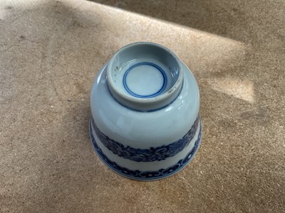 Lot 26 - Four piece of 18th and 19th century Chinese blue and white porcelain, including a candlestick / oil lamp base, vase, bowl and tea bowl