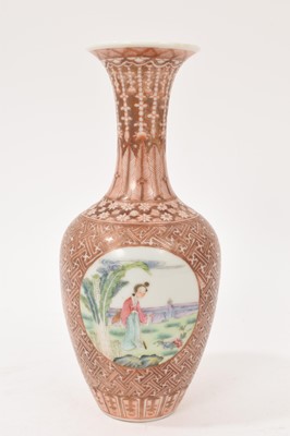 Lot 42 - Chinese porcelain baluster vase, 20th century, painted in famille rose enamels with circular panels containing figures and landscapes, on a patterned ground in gilt and red enamel, Qianlong seal...