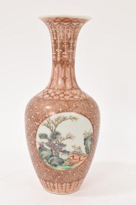 Lot 42 - Chinese porcelain baluster vase, 20th century, painted in famille rose enamels with circular panels containing figures and landscapes, on a patterned ground in gilt and red enamel, Qianlong seal...