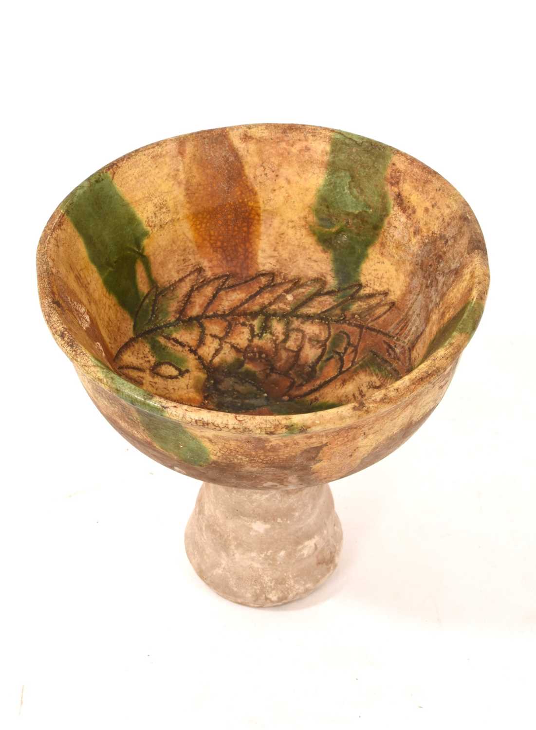 Lot 40 - Chinese Sancai glazed stem cup, with incised fish decoration