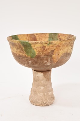 Lot 40 - Chinese Sancai glazed stem cup, with incised fish decoration