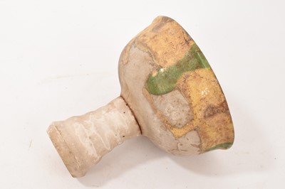 Lot 40 - Chinese Sancai glazed stem cup, with incised fish decoration