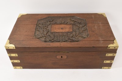 Lot 792 - Early 19th century brass bound oak box, the top carved with a coat of arms and bishop's mitre
