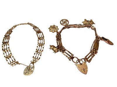 Lot 86 - Two 9ct gold gate bracelets both with padlock clasps and one with various charms
