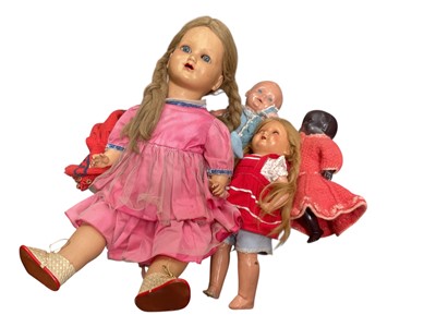 Lot 530 - Small group of vintage dolls and dolls clothing.