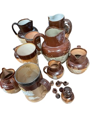 Lot 219 - Collection of Doulton stoneware harvest jugs