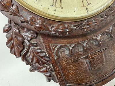 Lot 629 - Early Victorian drop dial wall clock with painted circular dial signed R.Lowe, Preston, single fusee movement in attractive carved oak Gothic influence case with carved oak leaf decoration 55cm...