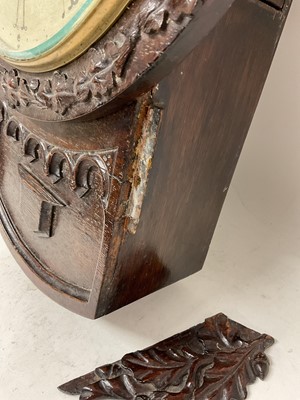 Lot 629 - Early Victorian drop dial wall clock with painted circular dial signed R.Lowe, Preston, single fusee movement in attractive carved oak Gothic influence case with carved oak leaf decoration 55cm...