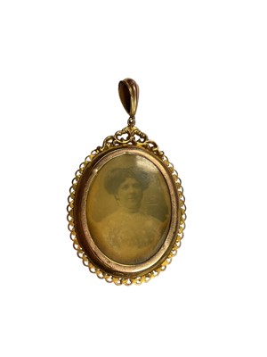 Lot 42 - Edwardian 9ct rose gold locket with glazed compartment