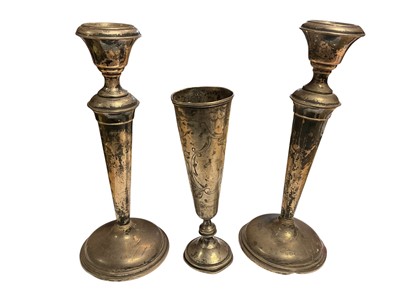 Lot 44 - Antique Russian silver spill vase and a pair of silver candlesticks