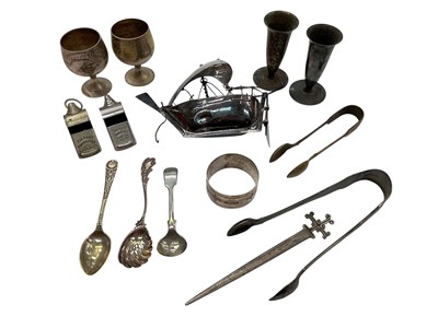 Lot 1157 - Pair Victorian silver sugar tongs, silver napkin ring and silver letter opener, together with a white metal boat and other plated items