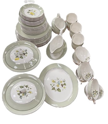 Lot 516 - Johnson Brothers dinner service with floral decoration.