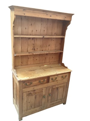 Lot 1261 - Pine two height dresser with two drawers and cupboards below, 112cm wide, 46cm deep, 183.5cm high