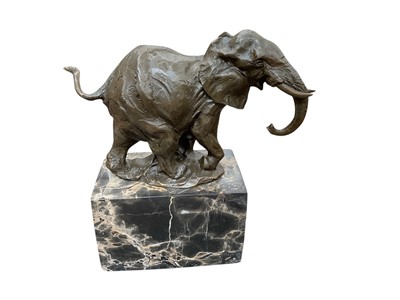 Lot 421 - Contemporary French bronze sculpture of an elephant, raised on a marble base, 22cm in overall height.