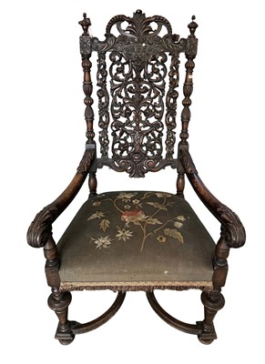 Lot 1363 - Jacobean revival high back elbow chair with needlework seat, together with another similar