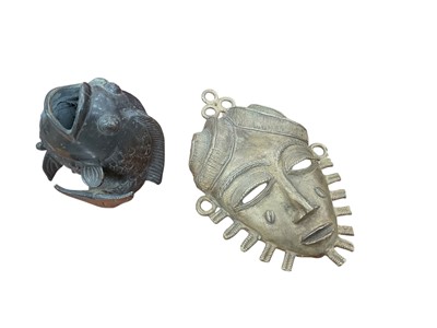 Lot 433 - Bronze fish together with a Benin type mask (2).