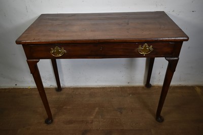 Lot 1280 - George II walnut single drawer side table