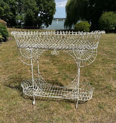 Lot 1370 - Victorian-style white painted wire work two tier plant stand, 107cm wide x 30cm deep x 93cm high
