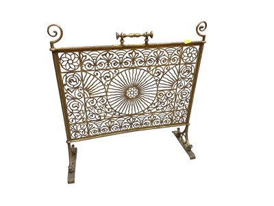 Lot 445 - Antique Aesthetic movement pierced brass fire screen.