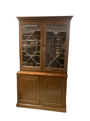 Lot 1351 - Nineteenth century mahogany bookcase on associated base