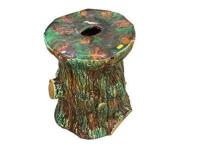 Lot 447 - Majolica garden seat in the form of a tree trunk, 47cm in overall height.