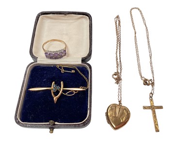 Lot 1107 - 9ct gold gem set wishbone bar brooch in fitted case, 9ct gold cross pendant on chain, 9ct gold back and front heart locket on chain and 9ct gold gem set dress ring