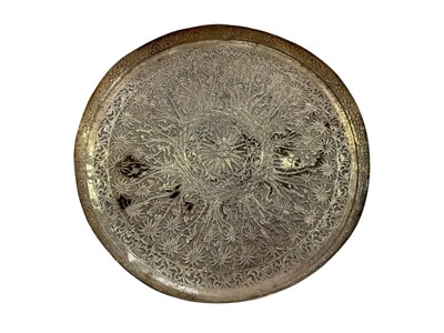 Lot 1167 - Indian white metal circular tray with palm tree and animal decoration