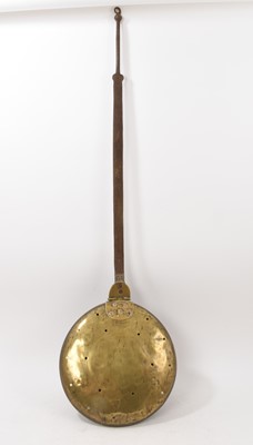 Lot 653 - 17th century brass warming pan, 110cm long