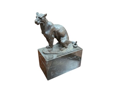 Lot 458 - Contemporary bronzed metal sculpture in the form of a panther, raised on a marble base, 18.5cm in overall height.