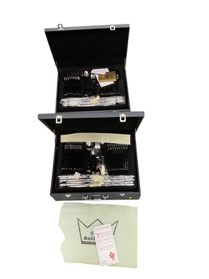 Lot 558 - Two vinyl canteen of German Solingen steel cutlery, (2).