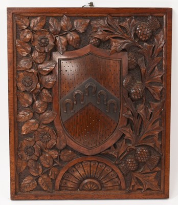 Lot 658 - Late 19th century relief carved walnut armorial panel, 28 x 32cm