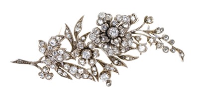 Lot Victorian diamond floral spray brooch with en tremblant flower