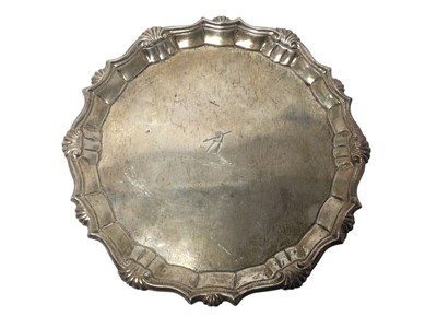 Lot 170 - Small Georgian silver waiter with crest