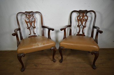 Lot 1316 - Pair of George I style leather upholstered open armchairs