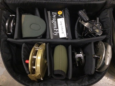 Lot 887 - Collection of fishing reels, fishing floats, rods, tripods, and paraphernalia