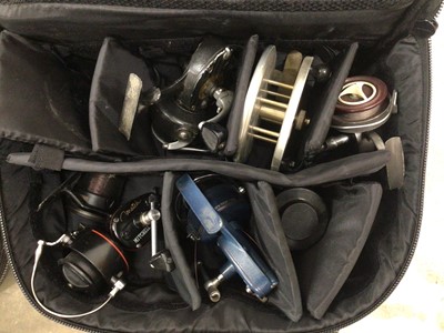 Lot 887 - Collection of fishing reels, fishing floats, rods, tripods, and paraphernalia