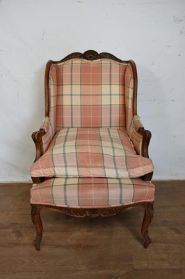 Lot 1343 - Continental walnut framed armchair, with square upholstered back and seat in acanthus and shell carved showwood frame on slender cabriole legs