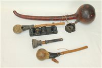 Lot 4246 - Three antique African gourd form pipes,...