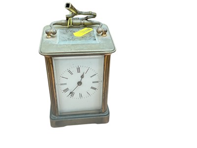 Lot 526 - Early 20th century carriage clock in brass case, with white enamel dial.