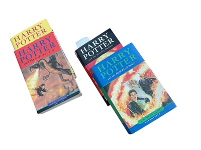 Lot 569 - Four Harry Potter books