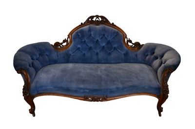 Lot 1350 - Victorian double ended button velvet upholstered sofa, with foliate carved showwood frame on cabriole legs and castors, 184cm long