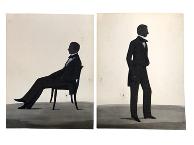 Lot 228 - A pair of early Victorian cut card and watercolour silhouettes signed and dated together with a Edwardian leather blotter and others